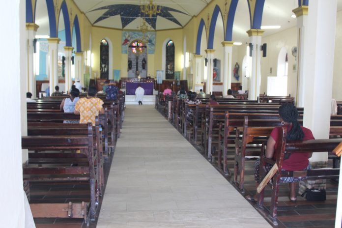 People in a church praying