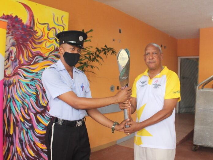 DOC President Billy Doctrove receives Baton