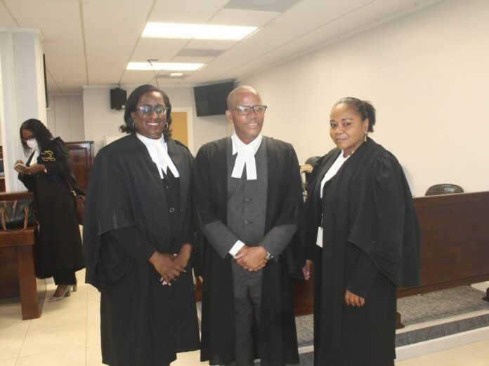 L/R Chief Magistrate Candia Carette George, Magistrate Bernard Pacquette, and Magistrate Pearl Williams