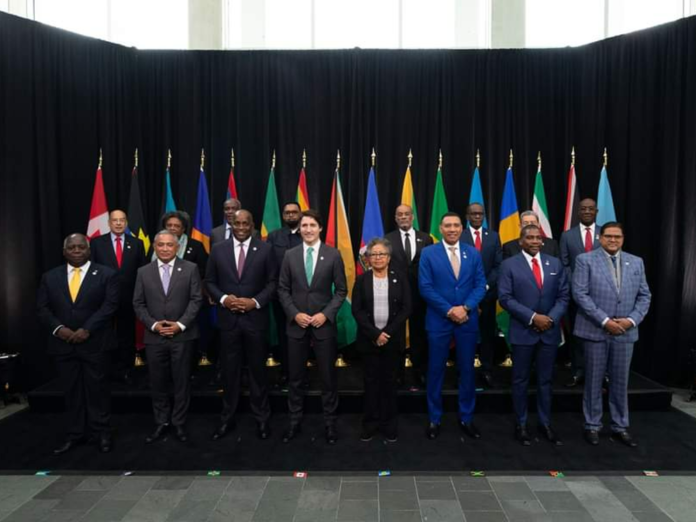 CARICOM LEADERS: Canadian Prime Minister Justin Trudeau and Caribbean leaders gather for a family photo at the Canada-Caricom summit in Ottawa, Canada, on Wednesday, October 18. Bottom row, left to right, Bahamas Prime Minister Philip Davis, Belize Prime Minister Johnny Briceno, Dominica Prime Minister Roosevelt Skerrit, Trudeau, Caricom Secretary General Dr Carla Barnett, Jamaica Prime Minister Andrew Holness, St Kitts and Nevis Prime Minister Terrance Drew and Suriname President Chan Santokhi. Top row, left to right, High Commissioner of Antigua and Barbuda Sir Ronald Sanders, Barbados Prime Minister Mia Mottley, Grenada Minister of Foreign Affairs Joseph Andall, Guyana President Mohamed Irfaan Ali, Haiti Prime Minister Ariel Henry, St Lucia Prime Minister Philip J Pierre, Prime Minister of St Vincent and the Grenadines Ralph Gonsalves and Trinidad and Tobago Prime Minister Dr Keith Rowley.