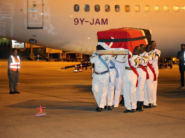 Panday's flagged draped coffin