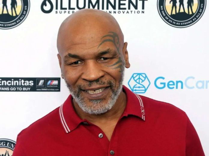 FILE - Mike Tyson attends a celebrity golf tournament in Dana Point, Calif., Aug. 2, 2019. Authorities will not file criminal charges against former heavyweight champ Mike Tyson after he was recorded on video punching a fellow first-class passenger aboard a plane at San Francisco International Airport last month, prosecutors announced Tuesday, May 10, 2022. (Photo by Willy Sanjuan/Invision/AP, File)