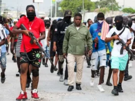 Former police officer Jimmy "Barbecue" Cherizier, leader of the 'G9' coalition, leads a march surrounded by his security against Haiti's Prime Minister Ariel Henry, in Port-au-Prince, Haiti. (Photo: REUTERS/Ralph Tedy Erol )