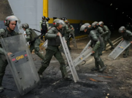 Armed police, military clear streets amid protest in Venezuela