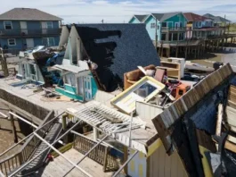 An aerial view shows a destroyed home in Surfside Beach, Texas, on July 8, 2024, after Hurricane Beryl made landfall. Hurricane Beryl made landfall July 8 in the southern US state of Texas, killing at least two people and causing millions to lose power amid dangerous winds and flooding, as some coastal areas remained under evacuation orders. (Photo by Mark Felix / AFP)