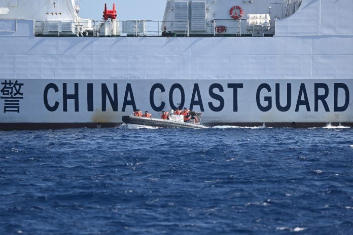 This photo shows an aerial view of China Coast Guard vessel inside Scarborough Shoal in the disputed South China Sea on Feb 16, 2024. (Photo: AFP/Jam Sta Rosa)