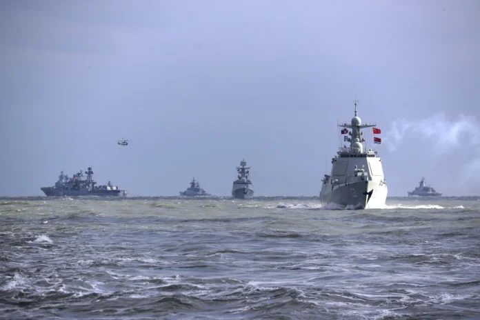 FILE - In this photo released by Xinhua News Agency, Chinese and Russian warships take part in a joint naval drills in the East China Sea, Dec. 27, 2022. (Xu Wei/Xinhua via AP, File)