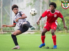 Harlem player (black and White) and Portsmouth Bombers player in Red