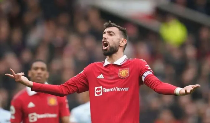 Manchester United's Bruno Fernandes reacts during the English Premier League football match between Manchester United and Aston Villa at the Old Trafford stadium in Manchester, England, Sunday, April 30, 2023. (AP Photo/Dave Thompson)