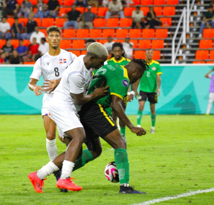 Dominica Travist Joseph under attack from DR players