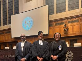 In photos: Hon. Attorney General Levi A. Peter, Annika Bellot, AoSiS Fellow, Vanica Sobers-Joseph, Senior State Attorney