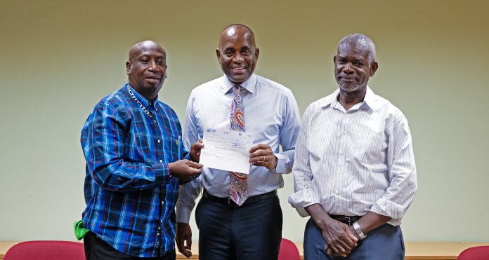 Leroy Charles, PM Skerrit and Chairman of DASPA