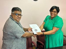 Gloria Joseph, Acting Permanent Secretary in the Ministry of Culture, Youth, Sports and Community Development and Director of Caribbean Building Specialties Ltd Mr. Kamlesh Sharma