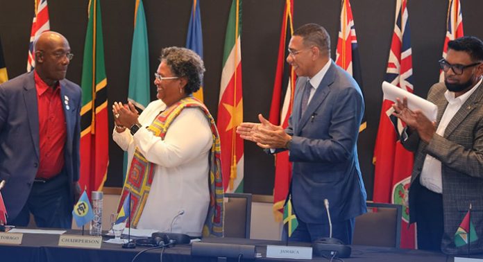 From left: The prime ministers of Trinidad and Tobago, Keith Rowley; Barbados, Mia Mottley; Jamaica, Andrew Holness and President of Guyana Irfaan Ali at 48th Summit of CARICOM in Bridgetown, Barbados on Friday, Feb. 21, 2025. (PhotoFacebook/Andrew Holness)