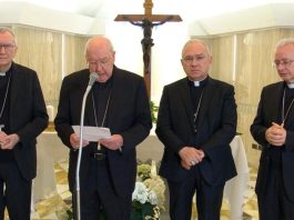 (L-R) Cardinal Pietro Parolin, Cardinal Kevin Farrell, Archbishop Edgar Peña Parra, and Archbishop Diego Ravelli stood in the Casa Santa Marta to announce the death of Pope Francis
