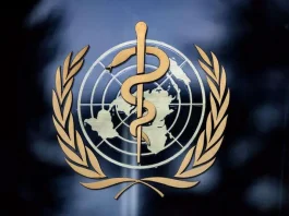 This photograph taken on December 7, 2021 shows a sign of the World Health Organisation (WHO) at their headquarters in Geneva.