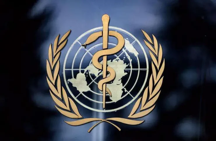 This photograph taken on December 7, 2021 shows a sign of the World Health Organisation (WHO) at their headquarters in Geneva.