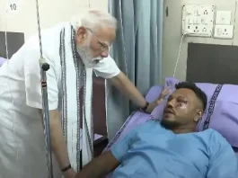 This screengrab of video footage taken and released by the Narendra Modi Youtube Channel on June 13, 2025 shows India's Prime Minister Narendra Modi (L) meeting with Vishwash Kumar Ramesh, sole survivor of the Air India flight 171 crash, at a hospital in Ahmedabad. (Photo: AFP)
