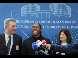 South Africa's Caster Semenya, centre, answers reporters with lawyers Gregory Nott, left, and Shona Jolly KC after Semenya won a partial victory at the European Court of Human Rights on in her seven-year legal fight against track and field's sex eligibility rules, Thursday, July 10, 2025 in Strasbourg, eastern France.