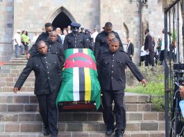 Police carrying the remains of the late Aird