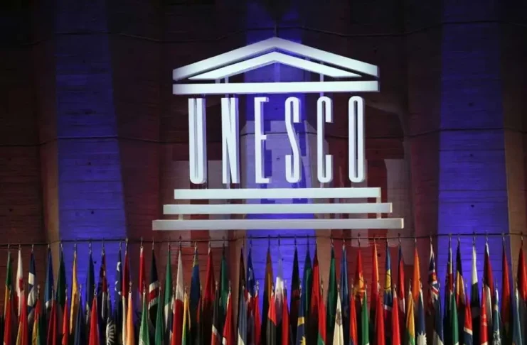 The logo of the United Nations Educational, Scientific and Cultural Organisation (UNESCO) is seen during the 39th session of the General Conference at the UNESCO headquarters in Paris, Saturday, November 4, 2017. The United States is ready to rejoin the U.N. cultural and scientific agency UNESCO â and pay more than $600 million in back dues -- after a decade-long dispute sparked by the organisation's move to include Palestine as a member. (AP Photo/Christophe Ena, File)