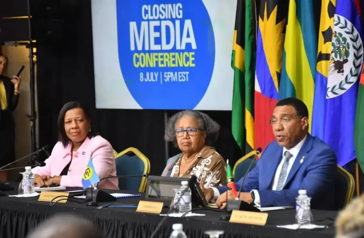Caricom chairman and Prime Minister of Jamaica Dr Andrew Holness addressing Tuesday evening’s media briefing at the end of the 49th Regular Meeting of the Conference of Heads of Government of the Caribbean Community in Montego Bay. At centre is Caricom Secretary General Dr Carla Barnett, while at left is Lavern Reid, communication advisor to the secretary general. )Photo: Naphtali Junior)