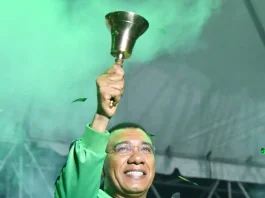 Jamaica Labour Party leader, Prime Minister Dr Andrew Holness, rings the bell after announcing that Jamaicans will vote in the next general elections on September 3, 2025. (Photo: Naphtali Junior)