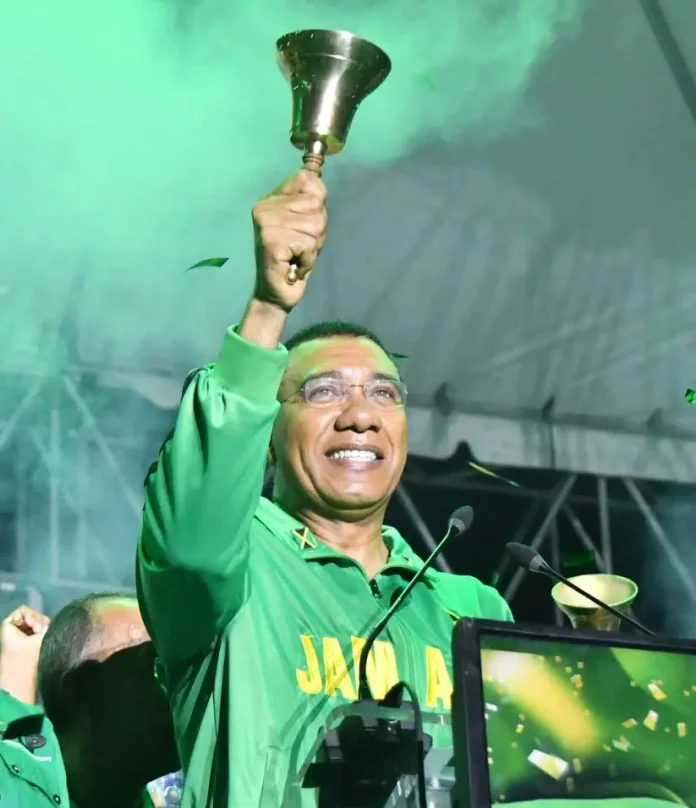 Jamaica Labour Party leader, Prime Minister Dr Andrew Holness, rings the bell after announcing that Jamaicans will vote in the next general elections on September 3, 2025. (Photo: Naphtali Junior)