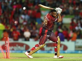 Kieron Pollard of Trinbago Knight Riders is bowled by Tabraiz Shamsi of St Lucia Kings during the 2025 Republic Bank Caribbean Premier League match at Brian Lara Cricket Academy on September 3, 2025 in Tarouba. - (CPL T20)