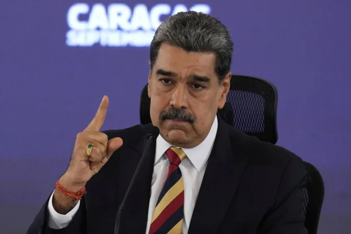 REGIME CHANGE’ POLICY: Venezuela President Nicolas Maduro speaks during a news conference yesterday in Caracas. —Photo: AP Ariana Cubillos