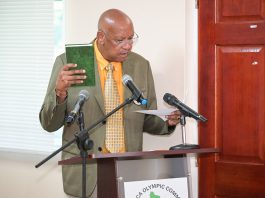 Billy Doctrove taking his oath for a third term as President of the Dominica Olympic Committee (DOC) All photos by Clyde K. Jno Baptiste of CKJB Photography