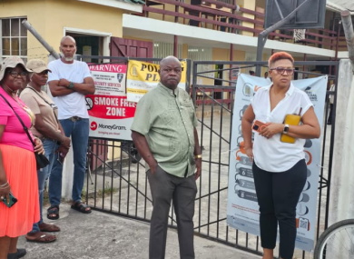 Opposition Leader Aubrey Norton waiting to cast his ballot in Monday’s general election
