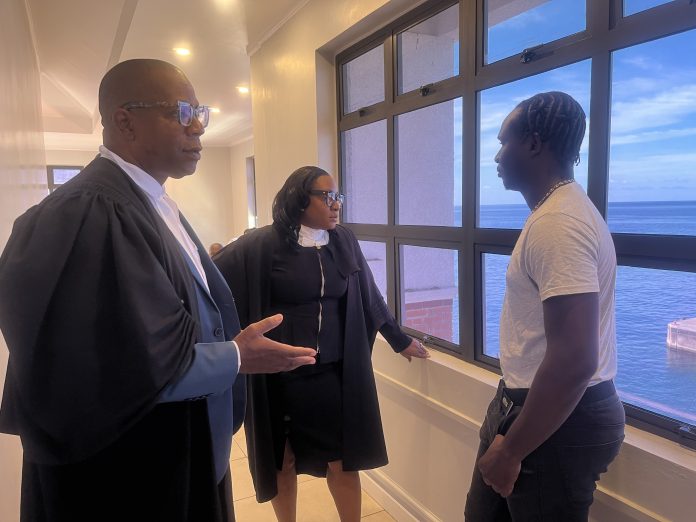 L/R Lawyers Wayne Norde, Gina Abraham-Thomas and accused George 