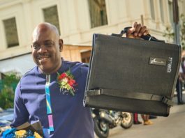 Finance Minister Ryan Straughn on his way to deliver the 2026-27 budget statement to Parliament on Monday.