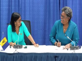 Prime Minister Mia Mottley (right) and Acting Venezuelan President, Delcy Rodriquez, share a light moment at the start of the news conference (CMC Photo)