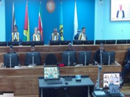 CARIBBEAN-COURT-Ramsamooj awarded US$30,000 in compensation following unlawful detention in Suriname CCJ President, Justice Winston Anderson (second from left) delivering the ruling in the case between political analyst Derek Ramsamooj and the state of Suriname (CMC Photo)
