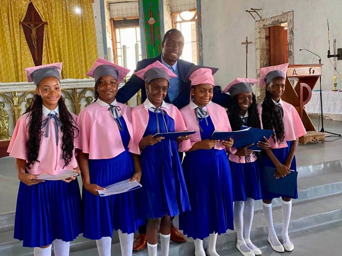 James-Rodney-and-the-2026-recipients-of-the-Marisa-Tricia-Rodney-Memorial-Scholarship-Programme.
