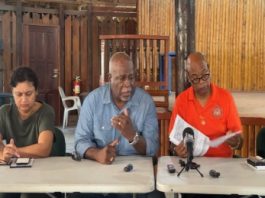 UPDATE-GUYANA-Rescuers remain hopeful all on board capsized boat will be rescued Prime Minister Mark Phillips (second from left) and Public Works Minister Juan Edghill, speaking at the news conference on Sunday morning (CMC Photo)