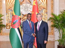 Member of the Political Bureau of the CPC Central Committee and Foreign Minister Wang Yi met in Shanghai with Foreign Minister of Dominica Vince Henderson